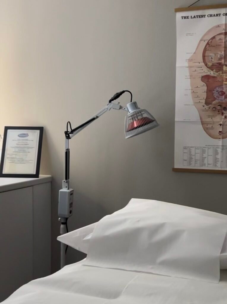 Infrared Heat lamp standing in clinic room
