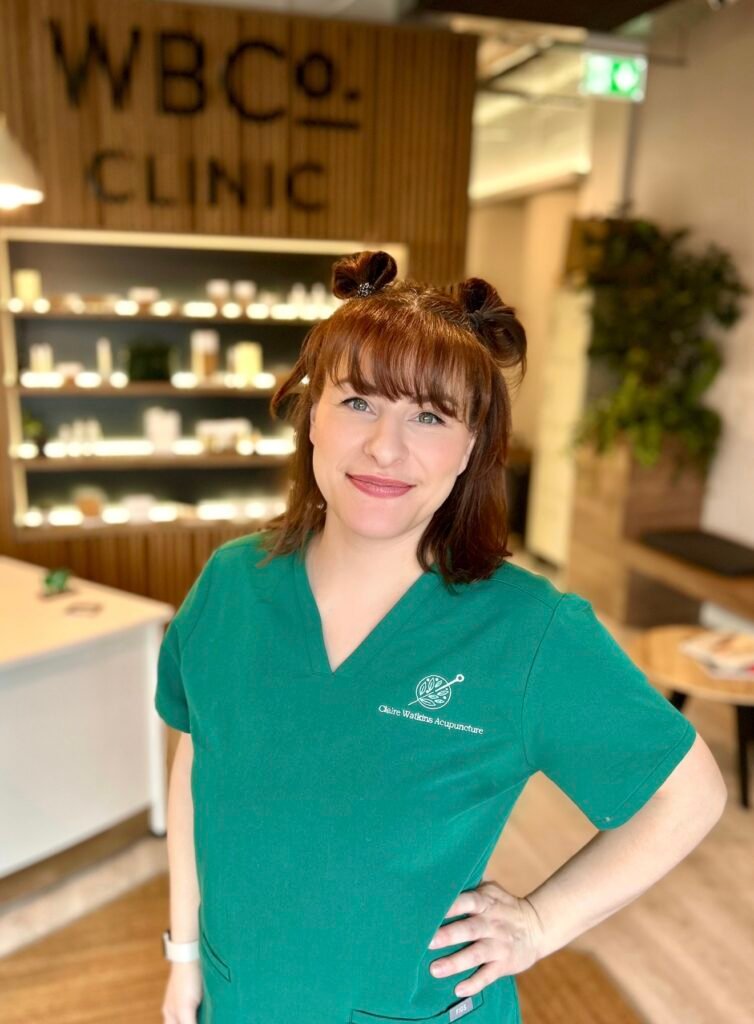 Claire standing in the reception of WBCo Clinic in Durham