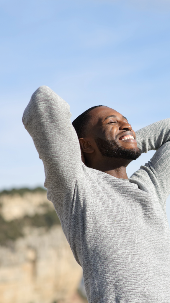 Man looking relaxed and stretching